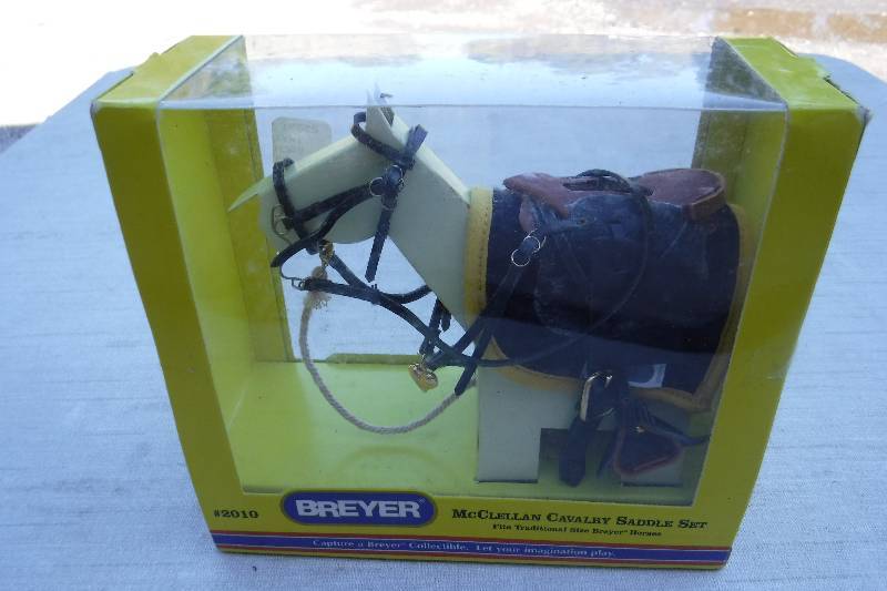 lot 7424 image: Breyer McCullain Cavalry saddle set for toy horse