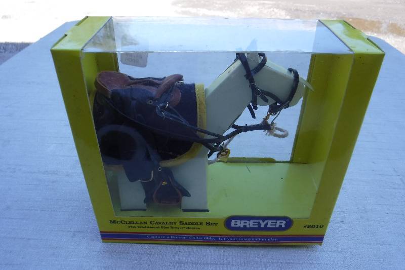 lot 7428 image: Breyer McCullain Cavalry saddle set for toy horse