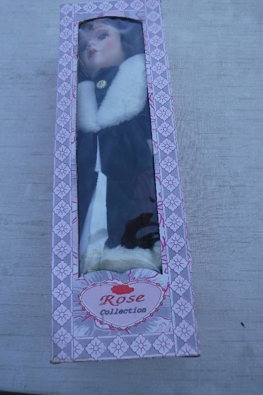 lot 7438 image: Rose Collection porcelain doll