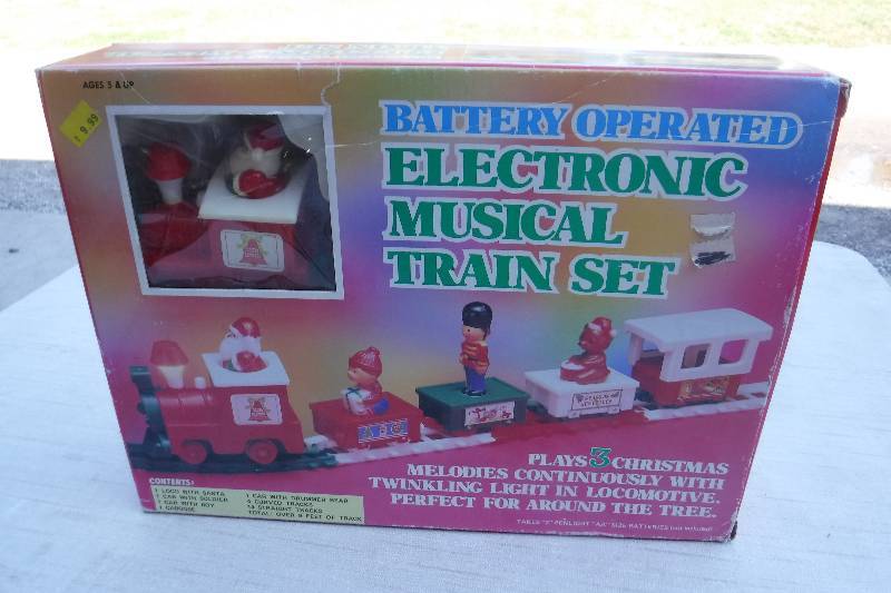 lot 7441 image: Battery operated Musical Christmas train