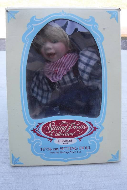 lot 7455 image: Sitting pretty Collection from Heritage mint  Charles Doll