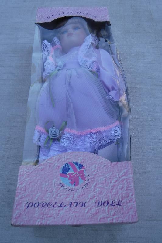 lot 7459 image: Porcelain doll