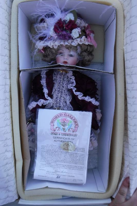 lot 7467 image: World gallery of dolls and collectables  Dominique porcelain doll