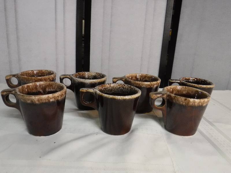 lot 9843 image: Hull stoneware brown drip glaze mugs lot
