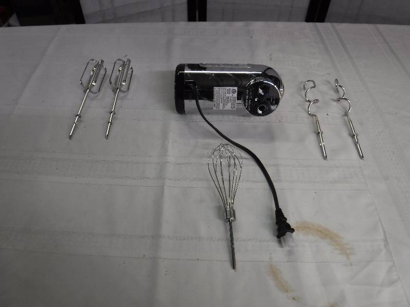 lot 6737 image: Dualit hand mixer with various paddles