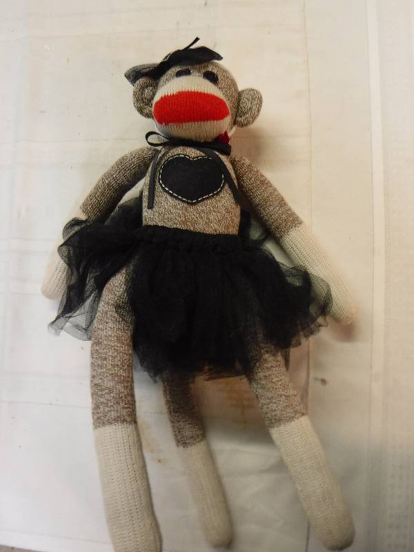 lot 6748 image: Heart Sock monkey in a black tutu