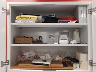lot 7272 image: Contents Of Cabinet, Salt, Corn Starch Gluten Free Teff Flour, Educational Books, And More