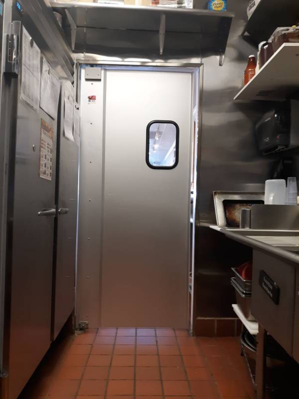 lot 1011 image: Swinging Door With Built In Window