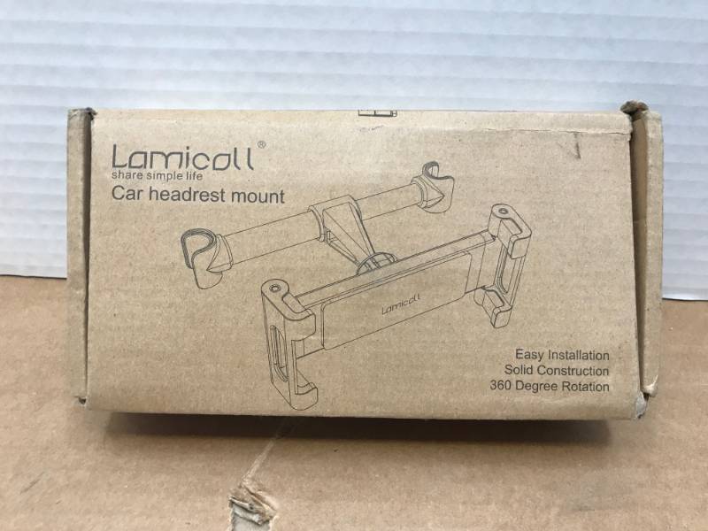 lot 3019 image: LAMICOLL CAR HEADREST MOUNT FOR IPHONE