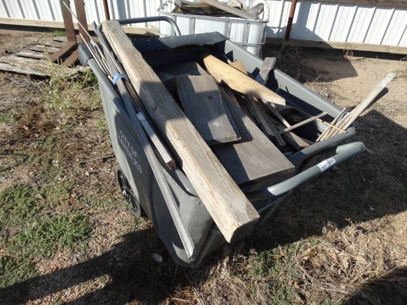 lot 5790 image: Trash dumpster full of wood