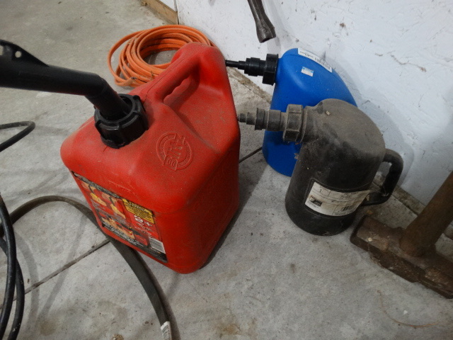 lot 2539 image: 2 battery fillers & plastic gas can