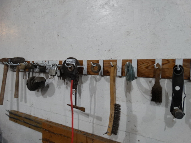 lot 2556 image: Lot of various tools on wall