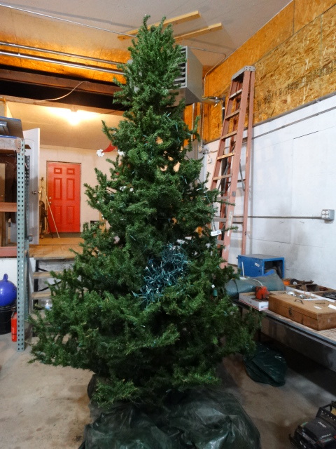 lot 2569 image: 8 - 10 foot Christmas tree w lights & storage bags