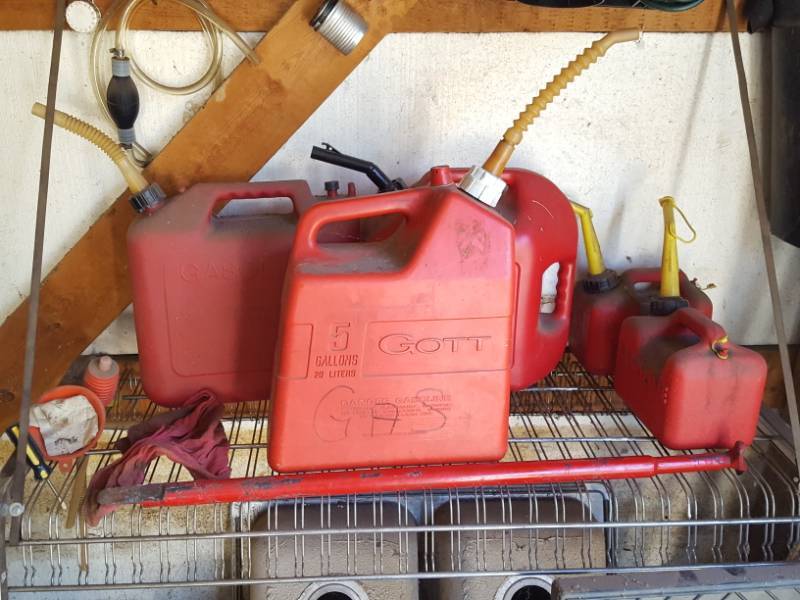 lot 3748 image: Assorted Gas Cans and Tire Tool