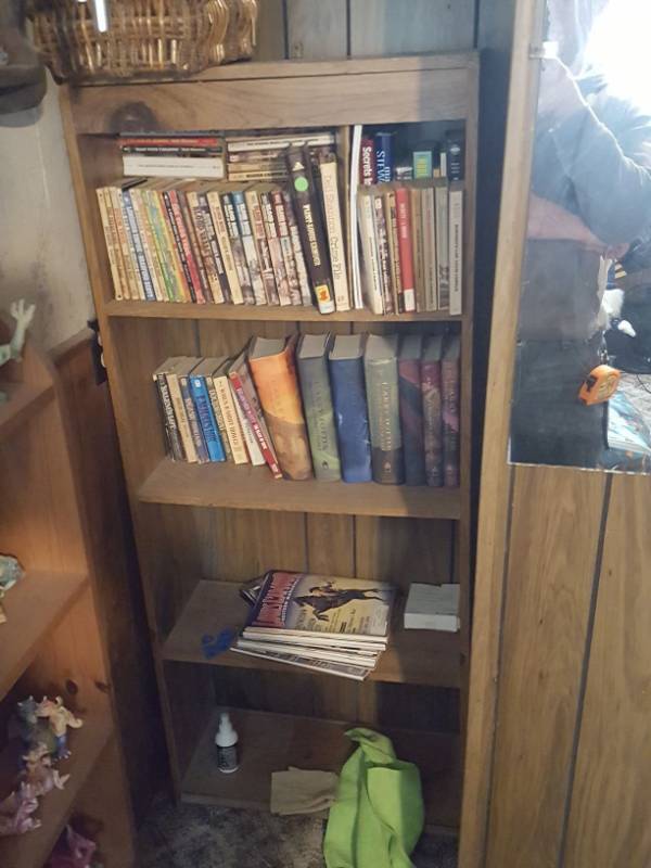 lot 3869 image: Bookshelf and Contents - Harry Potter books and Louis LAmour