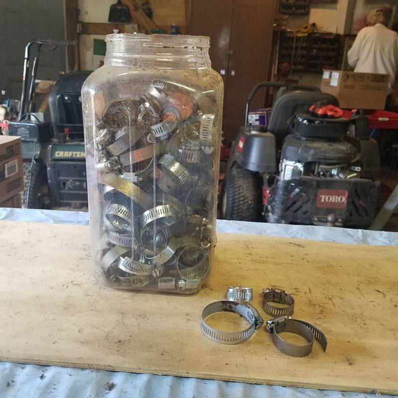 lot 3643 image: Container full of hose clamps
