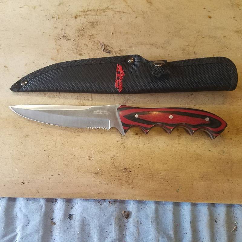 lot 3647 image: Black Hills steel knife with sheath