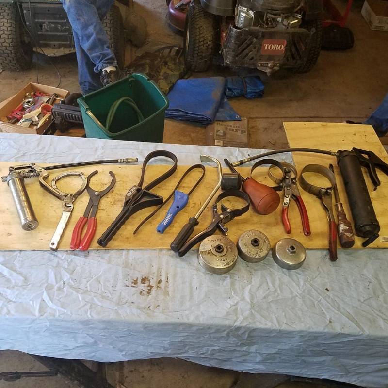 lot 3707 image: Oil Filter Wrenches and Grease Guns