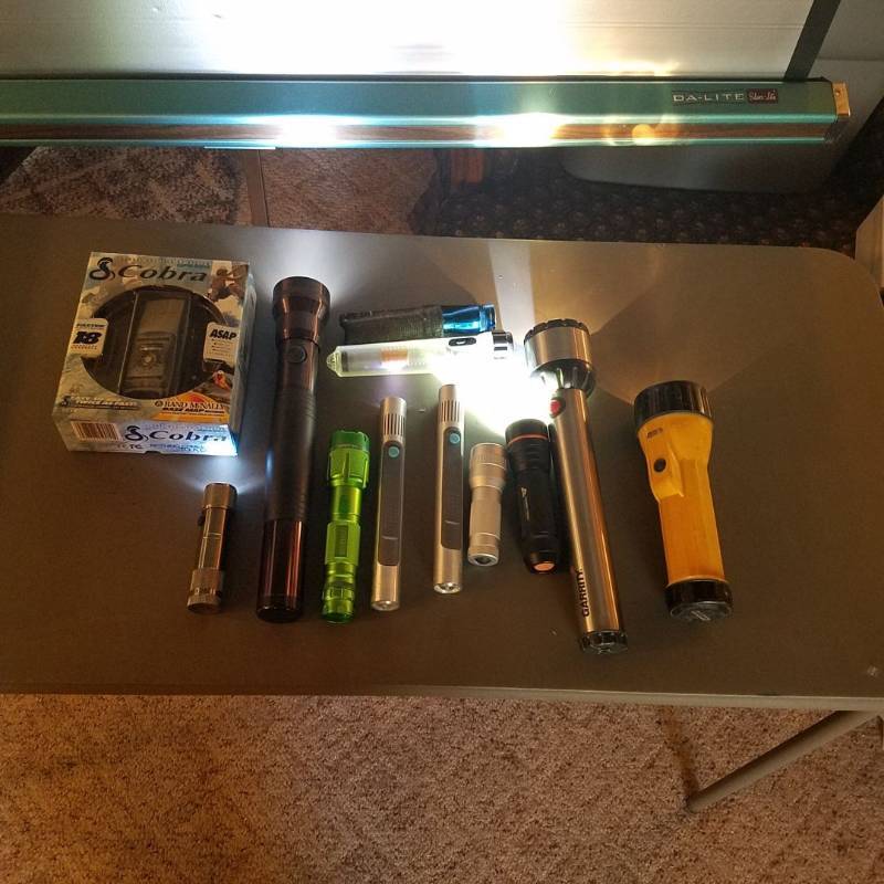 lot 3815 image: Assorted Flashlights and Cobra GPS 500