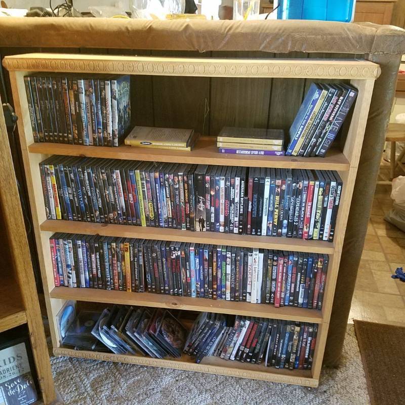 lot 3816 image: Shelf and Contents - lots and lots of DVDs