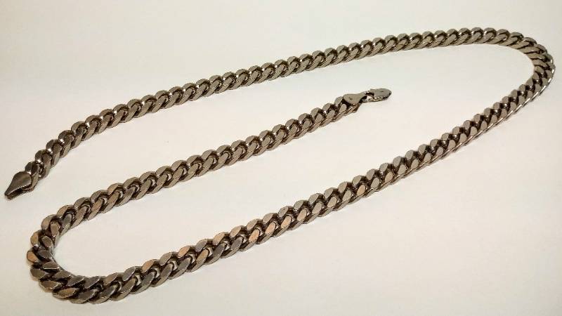 lot 2197 image: Large Cuban Link Chain  Silver Toned Marked 14K  Not Attracted to Magnet- UntestedVerified