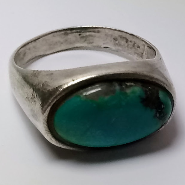 lot 2194 image: Charming Silver Toned Ring  No Stamp, but Not Magnetic