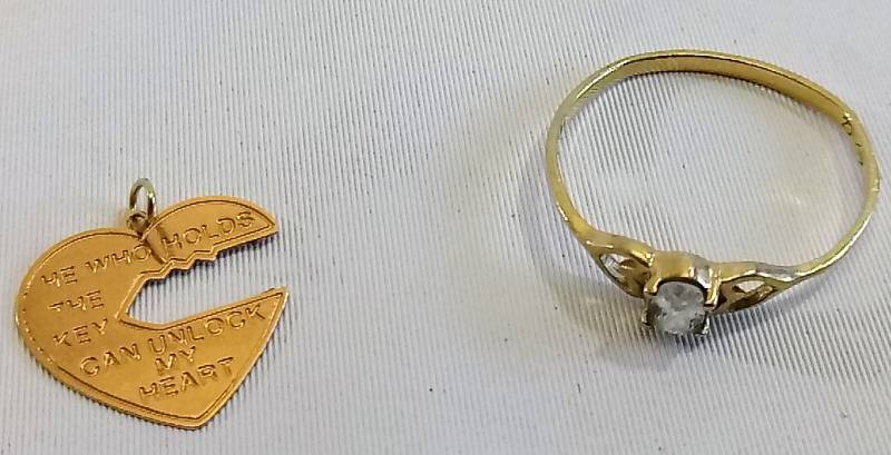lot 2200 image: 10K Gold Ring & Heart Pendant  (Says 14K on the Back)