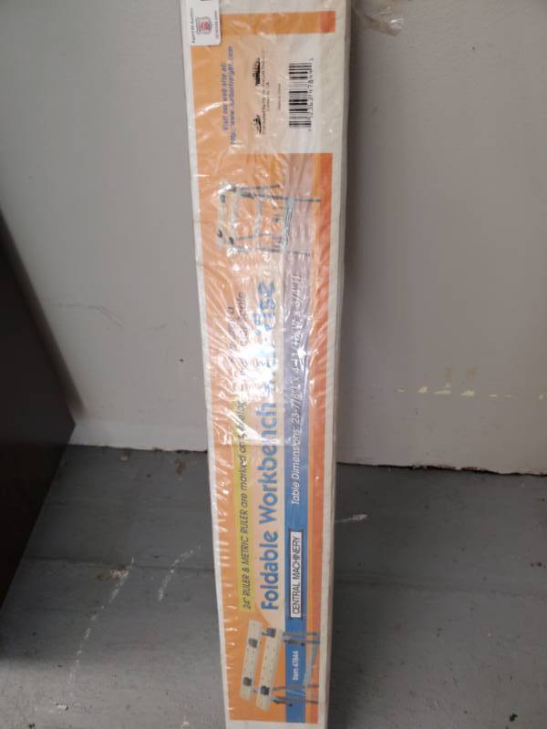 lot 2914 image: Central Machinery - Foldable Workbench with Vise  NIB