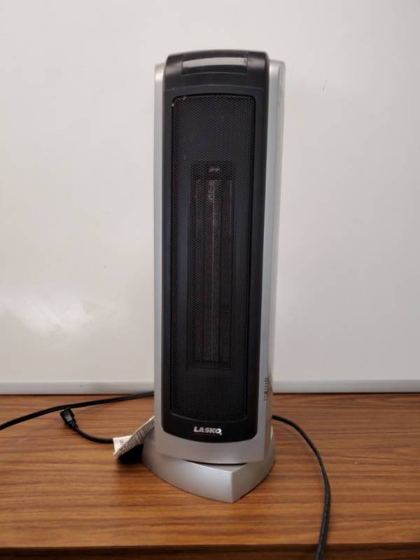 lot 2918 image: Lasko Tower Type Rotating Heater- Works