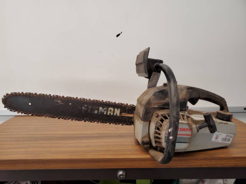 lot 3154 image: Craftsman Chainsaw-  14-15 inch bar- Pulls Freely