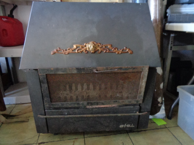 lot 8800 image: Shop Stove  Wood burner with pipe
