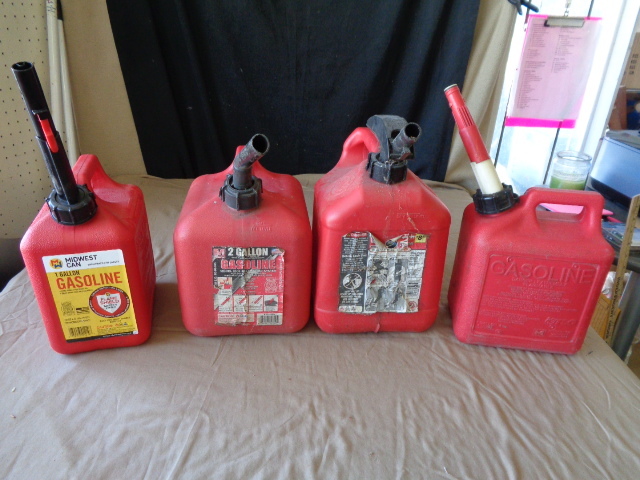lot 8807 image: 4 gas cans  2-one gal and 2-two gallon