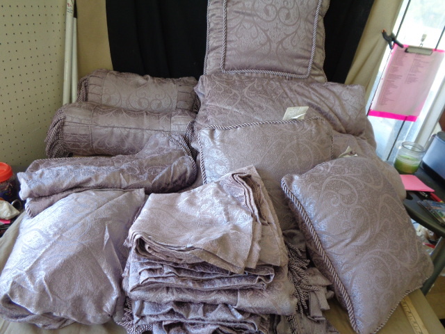 lot 8847 image: King size comforter, bed skirt,2 pillow case,5 pillows and curtains