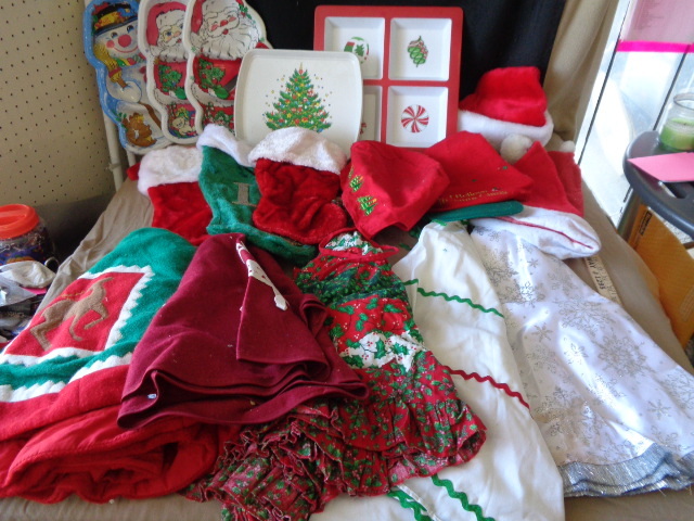 lot 8870 image: Tree skirts, stockings, hats, trays