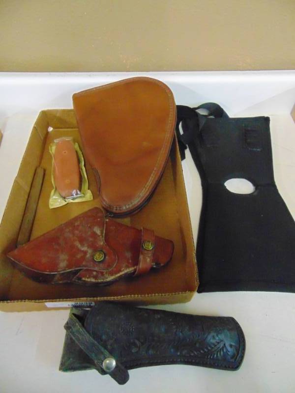 lot 2939 image: Leaather Holsters - Butt Pad and more