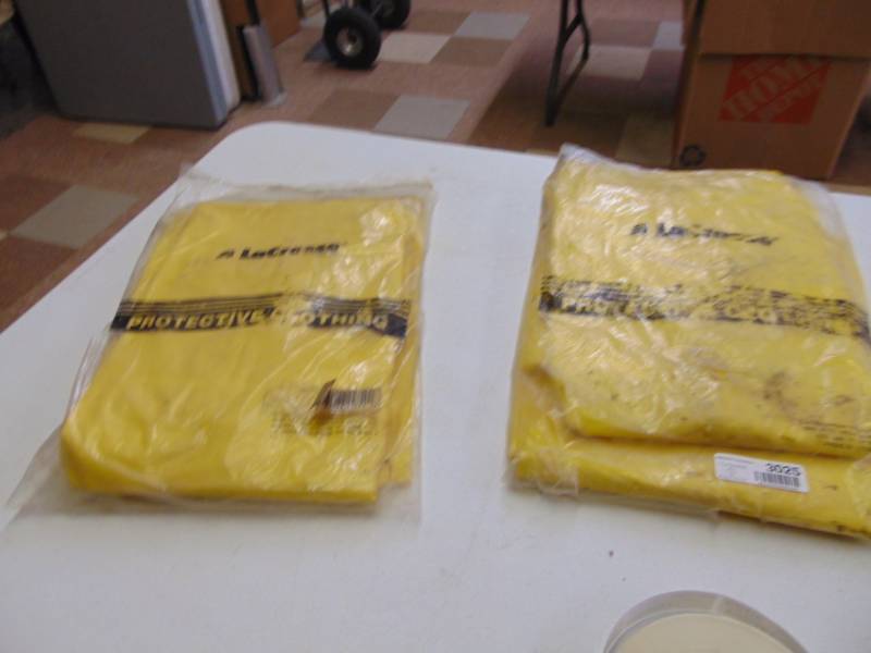 lot 3025 image: pair of Lacross XL Foul weather gear