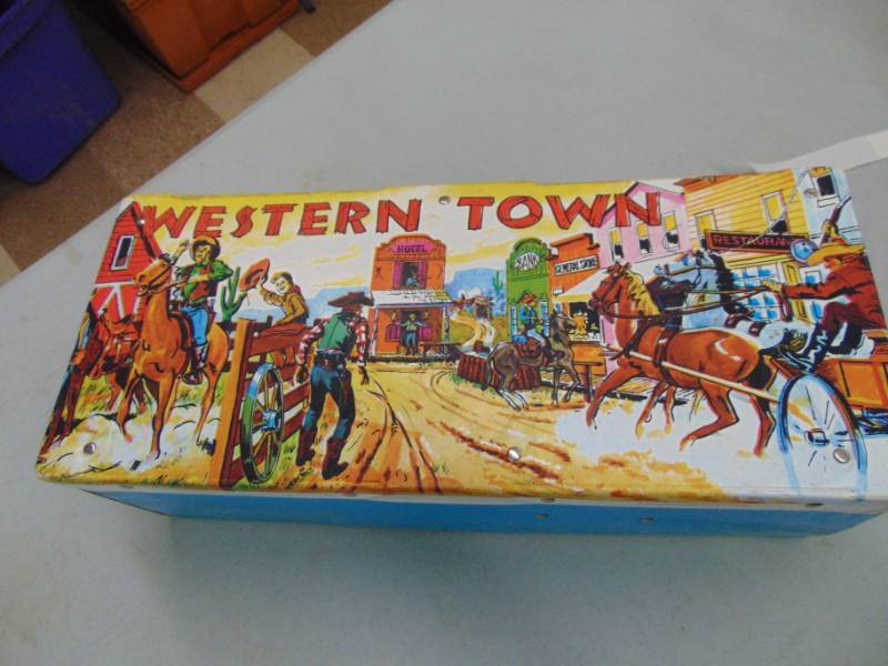 lot 3031 image: Western Town Plastic Case