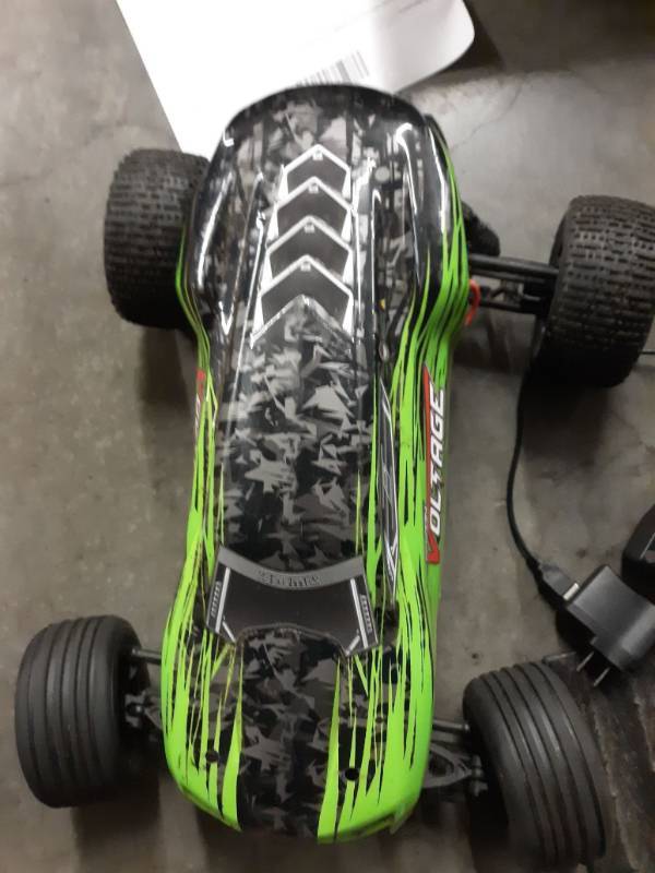 lot 10154 image: Brand Arrma 110 Fazon Voltage 2wd Mega Rtr Green  Black Rc Truck Arad11