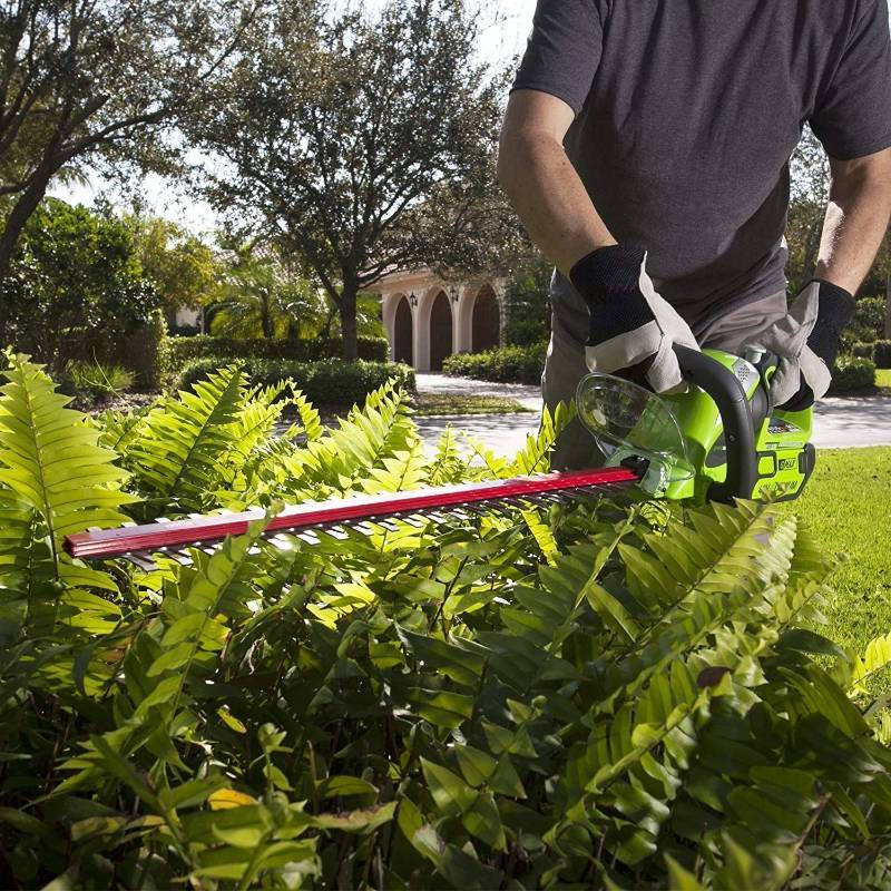lot 10659 image: GreenWorks Rotating Hedge Trimmer 40V 24  Blade, Battery Not Included, Used