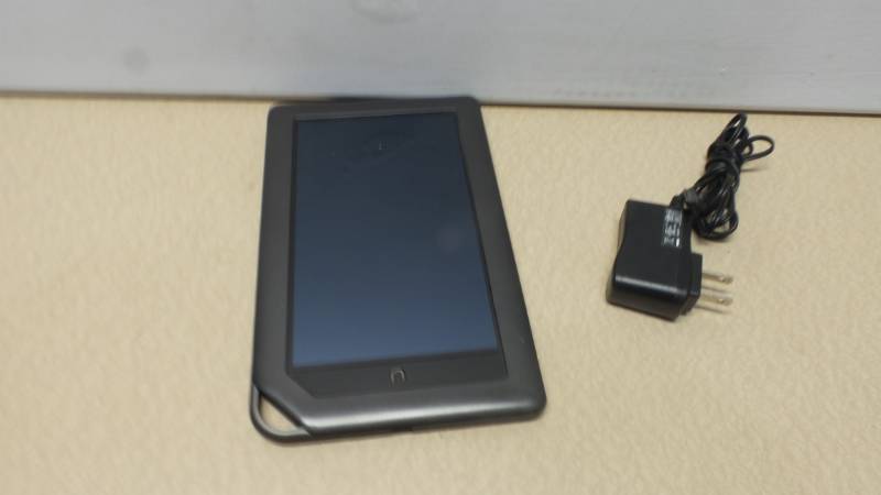lot 6387 image: Nook tablet (powers on, needs charge)