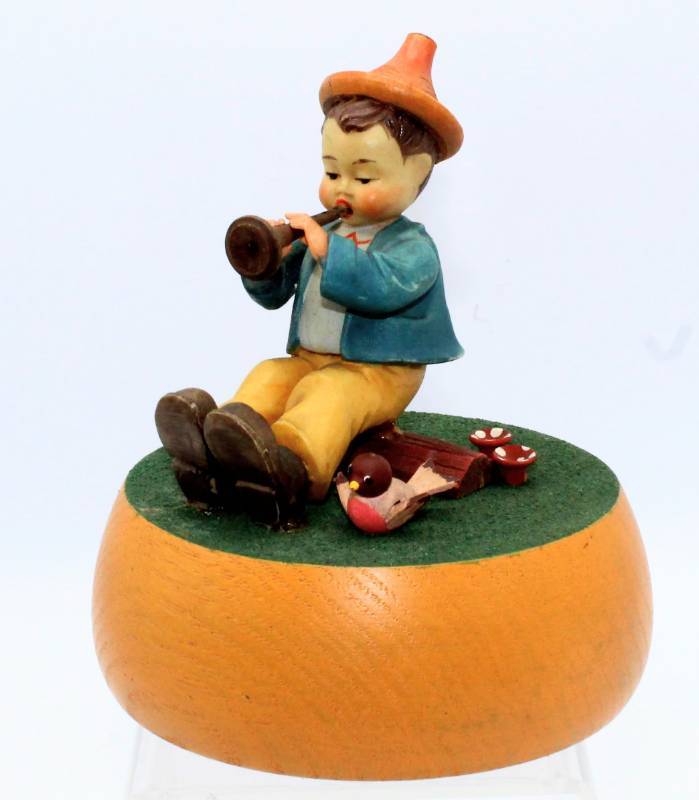 lot 1857 image: ANRI Reuge Music Box Plays The Sound of Music  Little Boy Playing a Horn