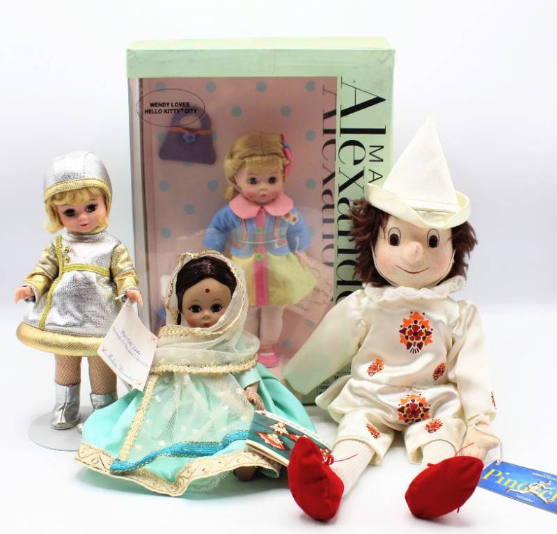 lot 1864 image: (4) Madame Alexander Dolls - Wendy Loves Hello Kitty, Blast Off 2000, Friends From Foreign Lands India and Pinocchio for FAO Schwarz