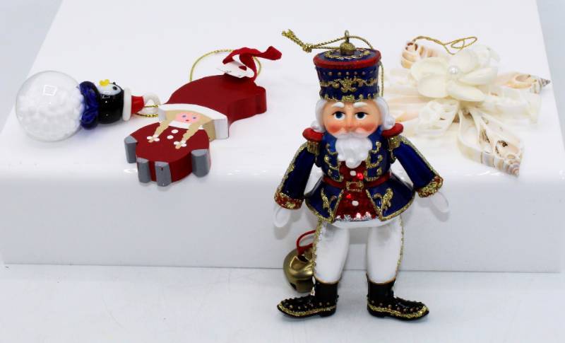 lot 1870 image: Collectible Christmas Ornaments - incl Glass Nutcracker and Penguin