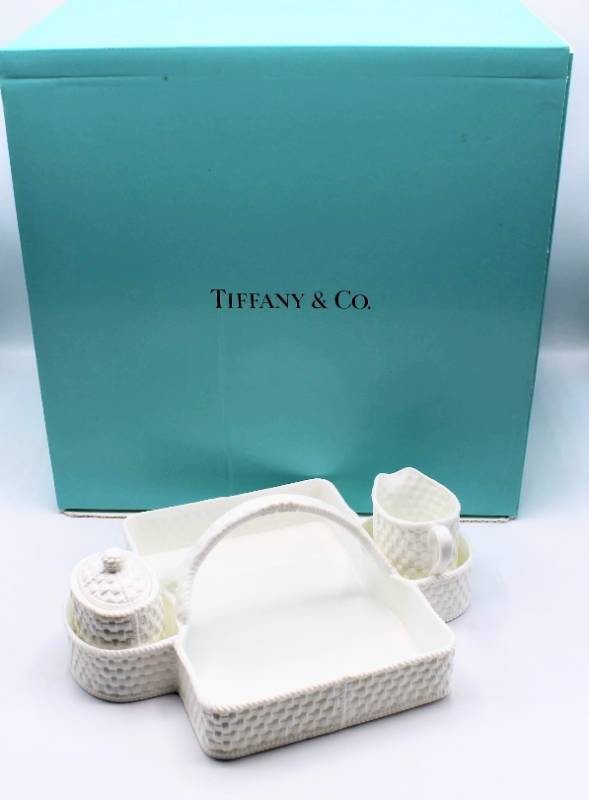 lot 1782 image: Tiffany & Co. Berry Basket with Sugar and Creamer - 3 pc set in Tiffany Box  Pattern  Tiffany Weave