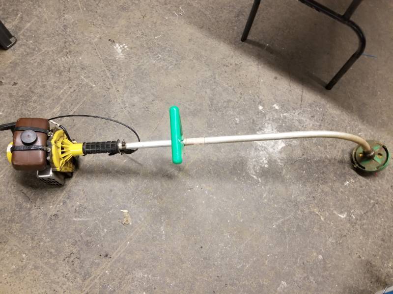 lot 2105 image: Weed Water Brand Gas Powered Weedeater