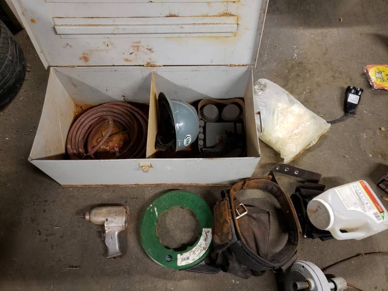 lot 3015 image: Metal Foot Locker with Tool Belt, Air Hose,Rockwell Impact, and More