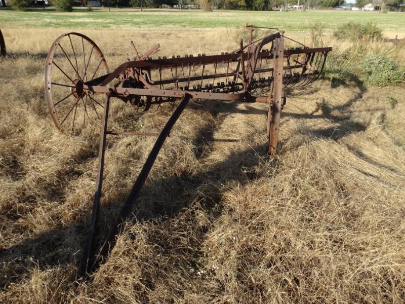 lot 2917 image: Old metal wheel farm implement- Pull behind hay rake