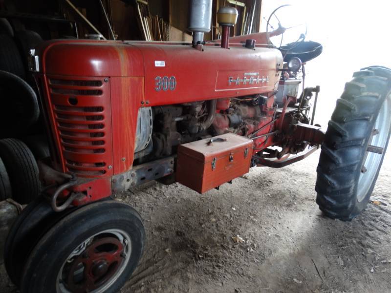 lot 2958 image: McCormick Farmall 300 Tractor w toolbox- RunsDrives