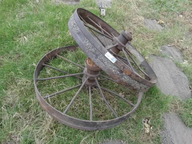 lot 2976 image: 2 old metal implement wheels