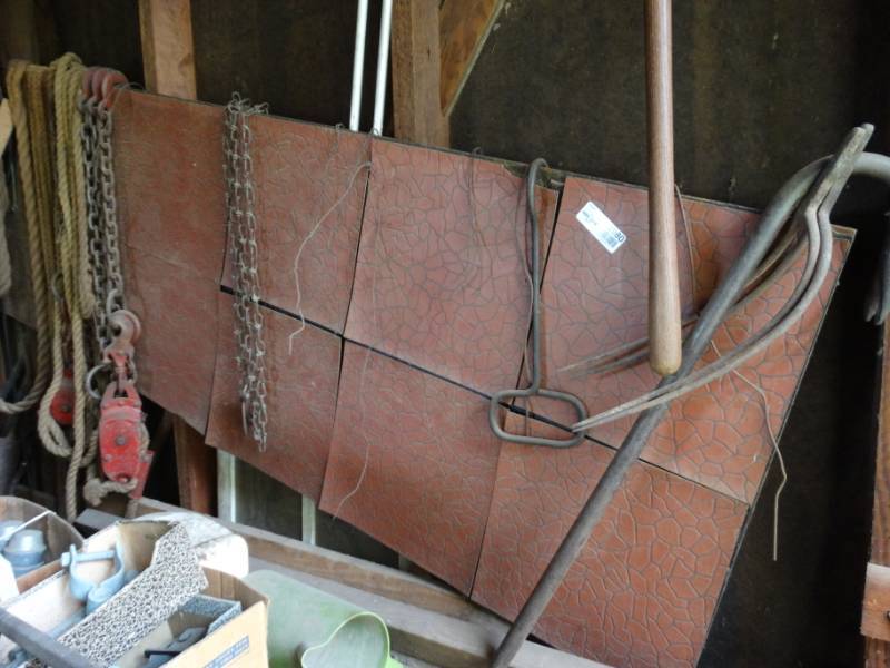 lot 2980 image: Chain hay hook & assorted items on wall
